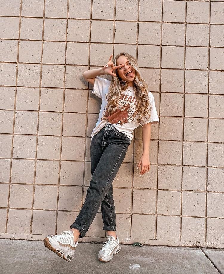 Relaxed Weekend Style Featuring a Retro Cream Graphic Tee and Black Denim