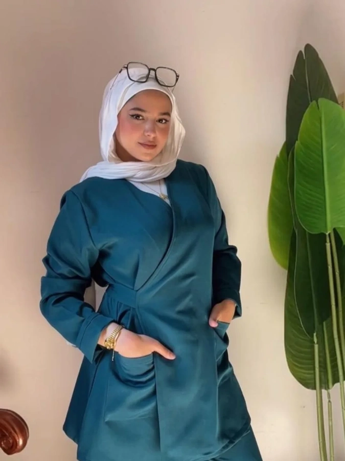 Teal Wrap-Style Scrub With Modern Flair