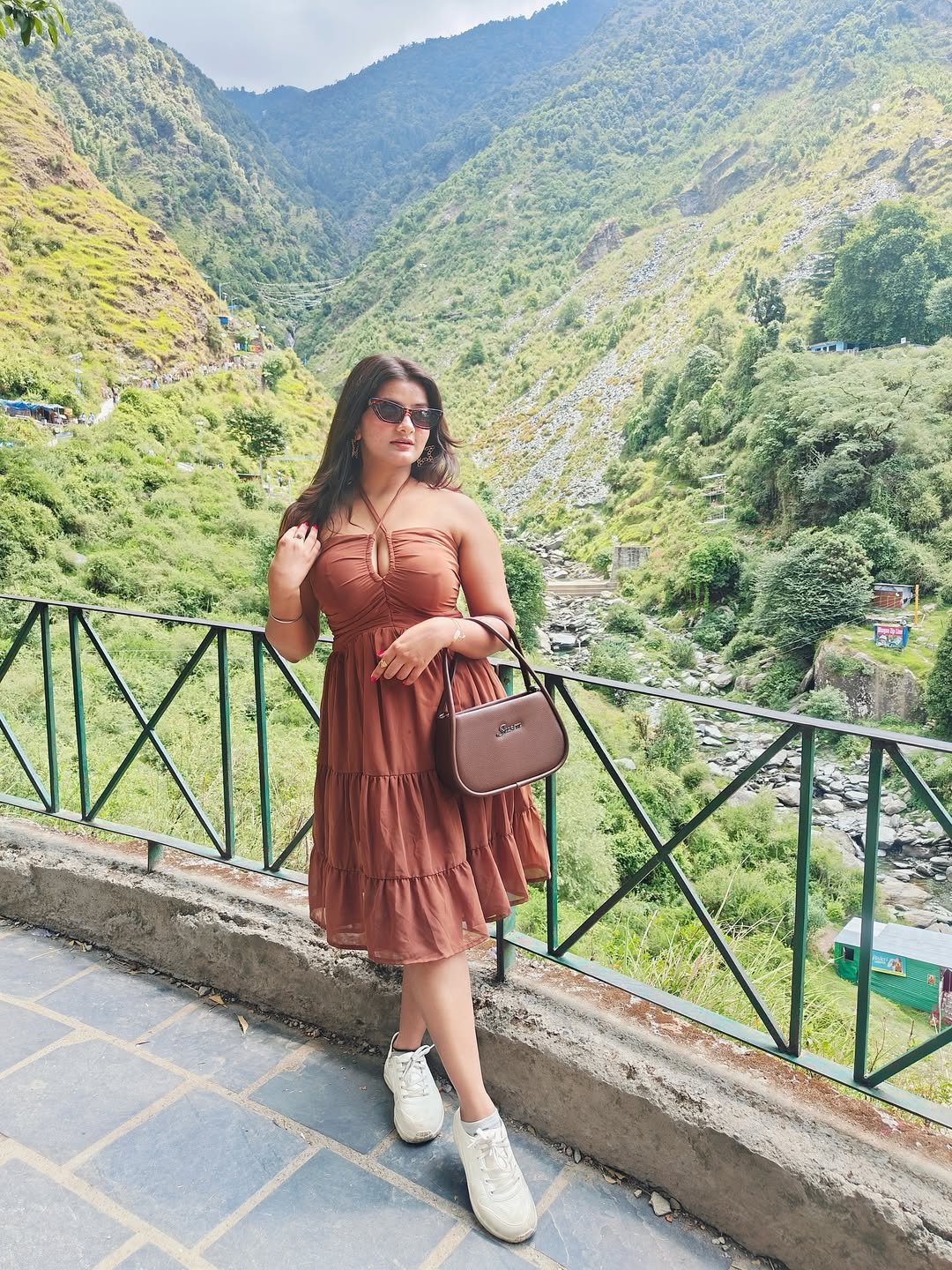 Terracotta Halter-Neck Tiered Mini Dress with Cream Sneakers and Chocolate Shoulder Bag