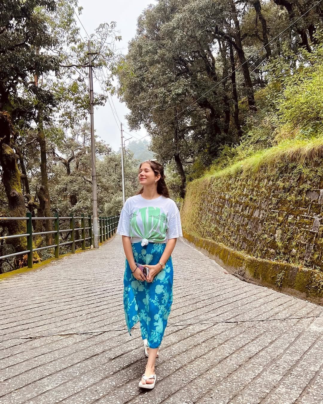 Tied Graphic Tee with Cerulean Floral Midi Skirt and Casual Platform Sandals