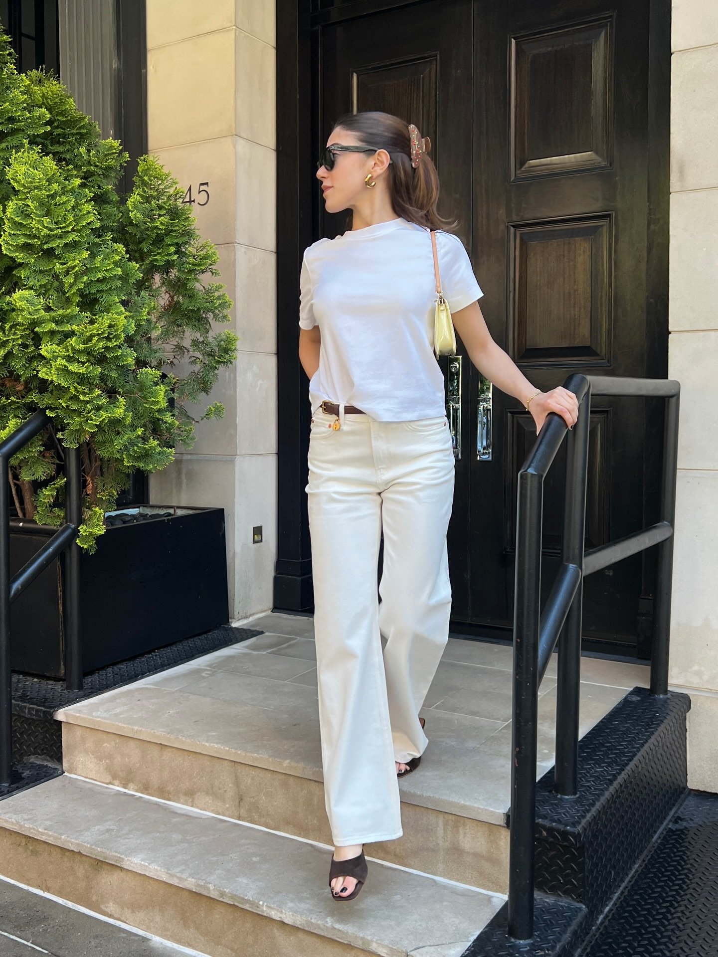 Wide-Leg White Jeans with Classic Crewneck Tee and Pale Yellow Shoulder Bag