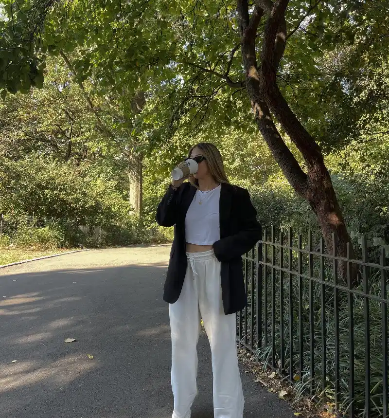 Black Blazer with White Crop Top and Relaxed Trousers