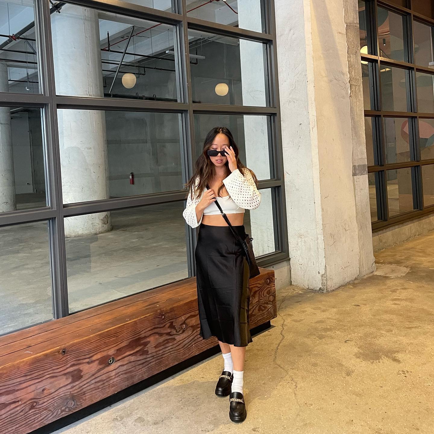 Black Satin Slip Skirt with Eyelet Knit Cardigan and Loafers