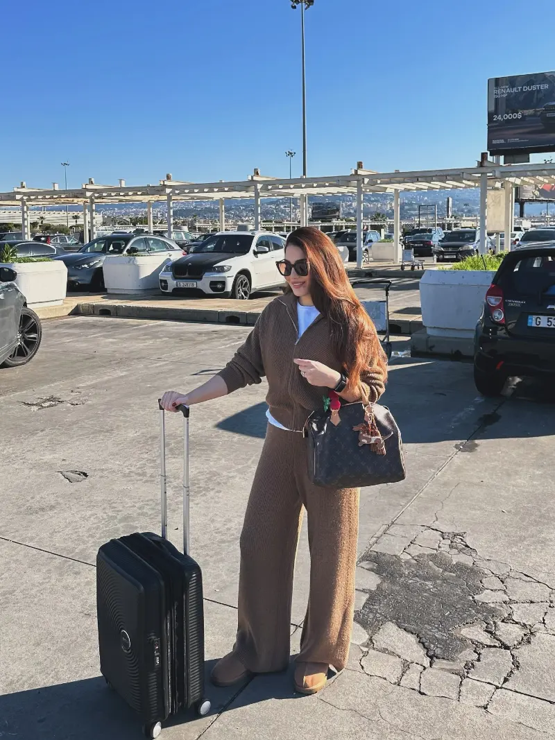 Brown Knit Tracksuit with Rolling Suitcase and Monogram Handbag