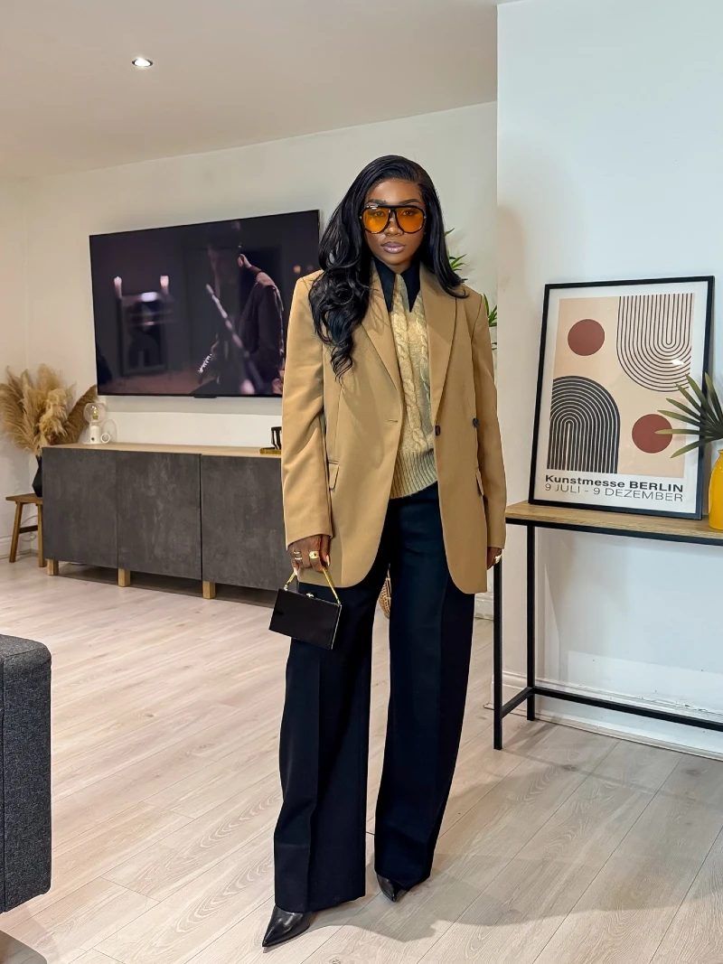 Camel Blazer over Cable-Knit Vest and Wide-Leg Trousers