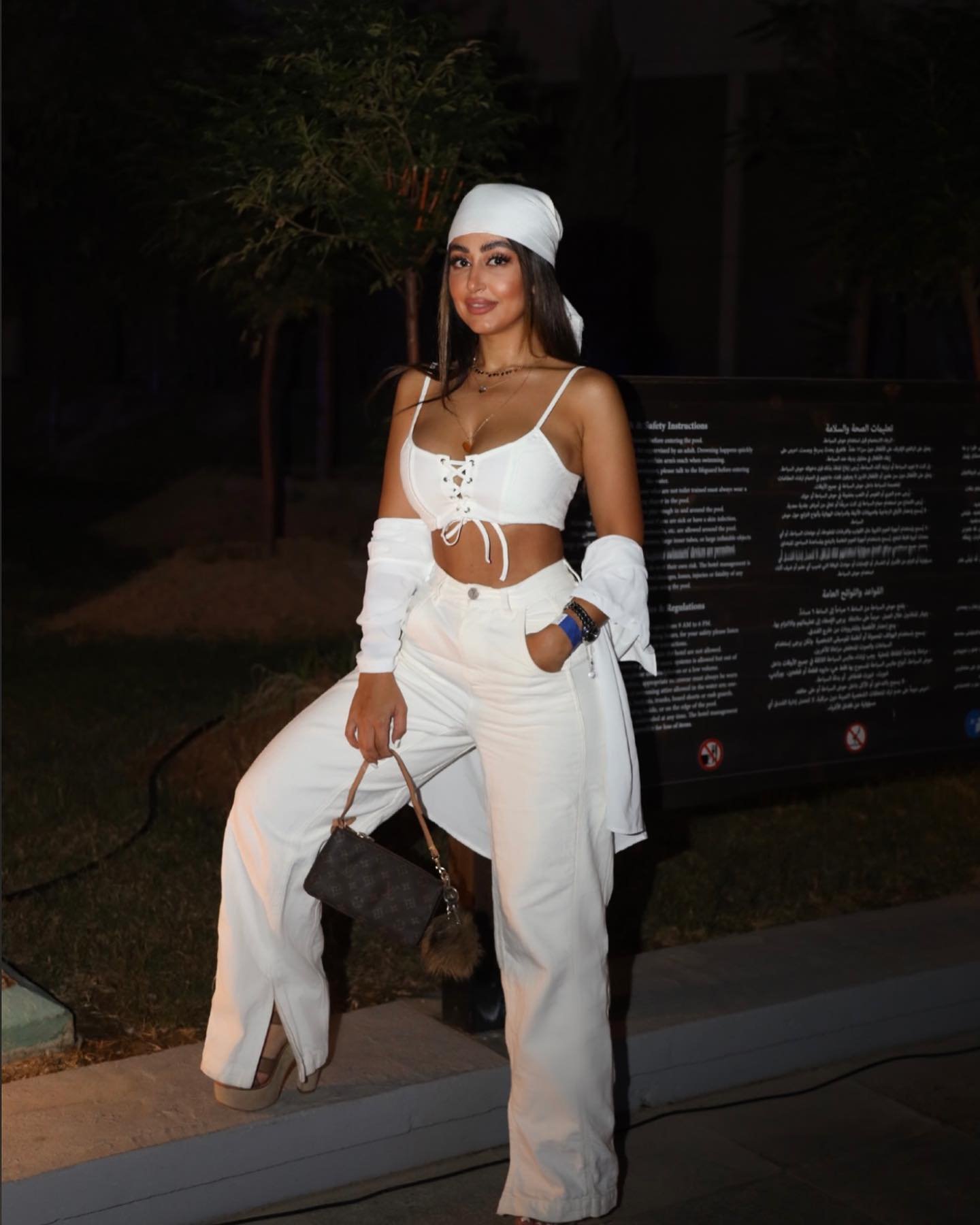 Casual All-White Ensemble with Headscarf Accessory