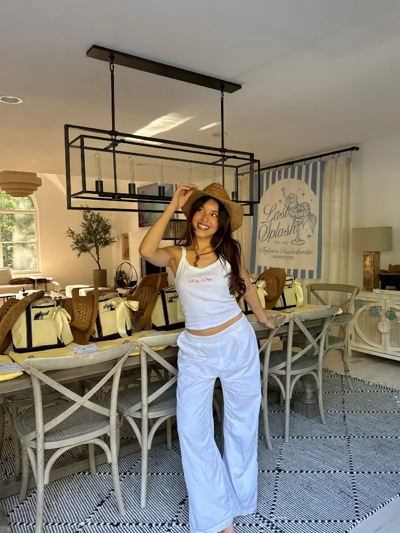 Casual White Tank and Relaxed Trousers with Straw Hat