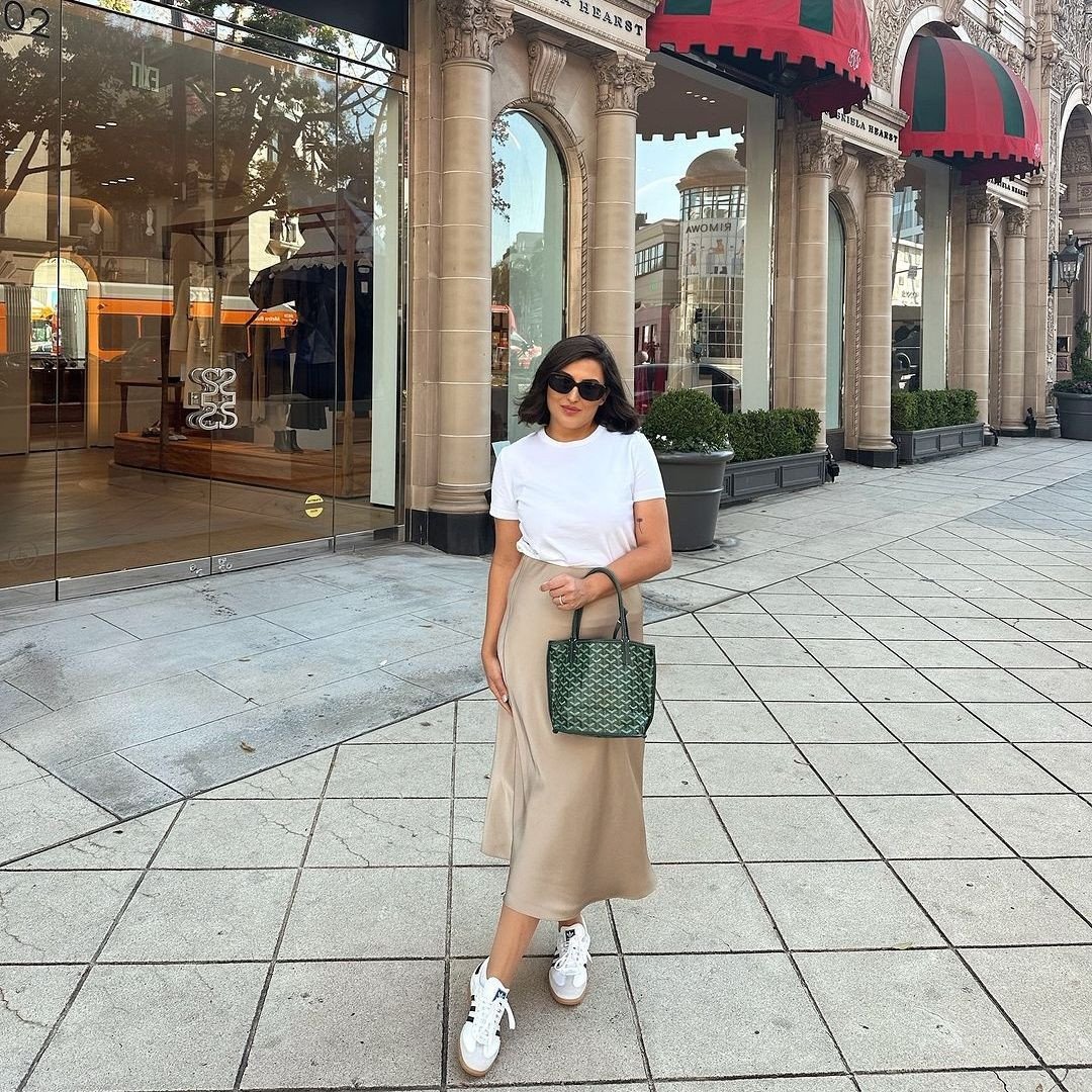 Champagne Satin Midi with White Tee and Leather Top-Handle Bag