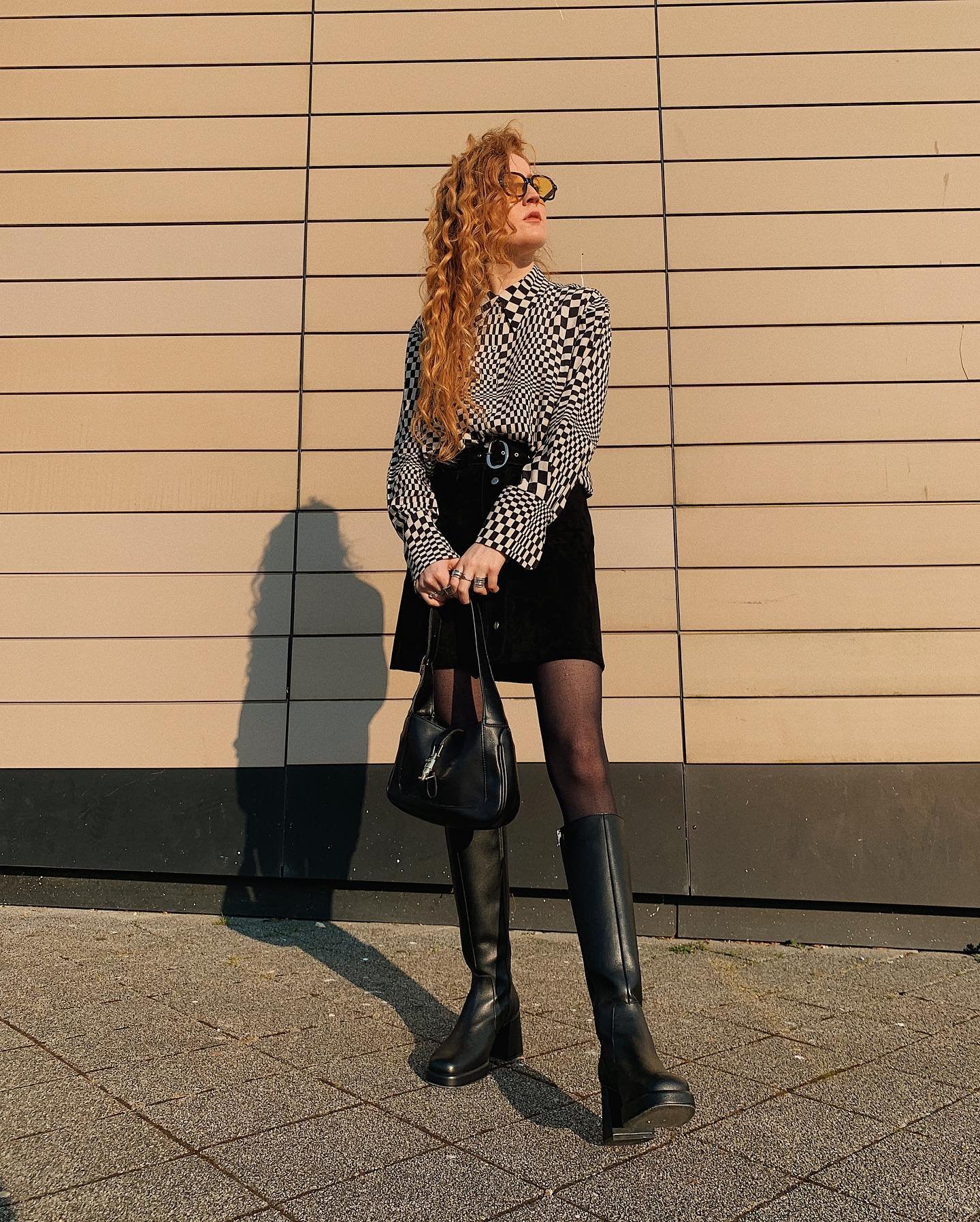 Checkerboard Print Button-Down Shirt with Suede Black Mini Skirt and Platform Leather Boots Display