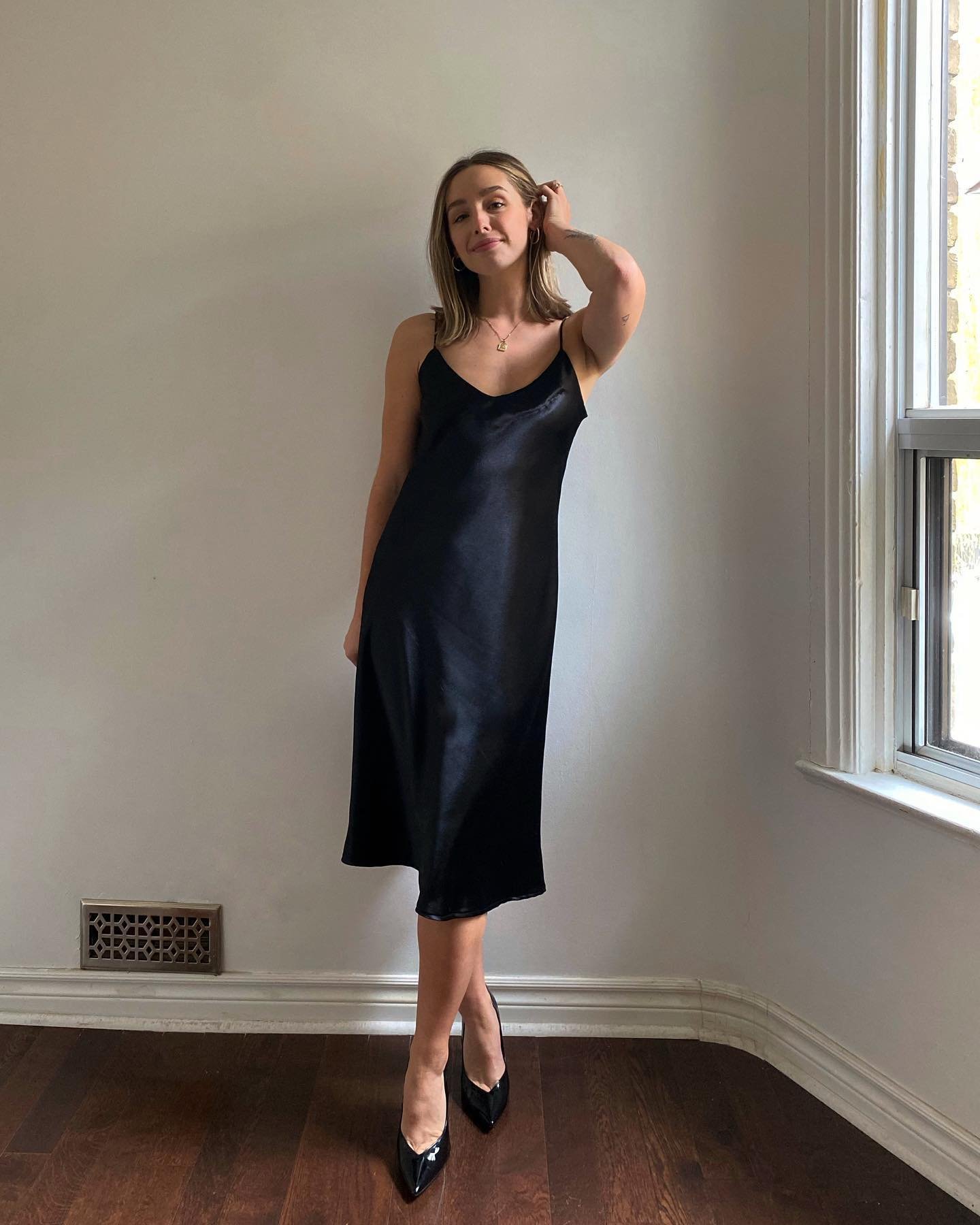 Classic Black Slip Dress with Polished Pumps