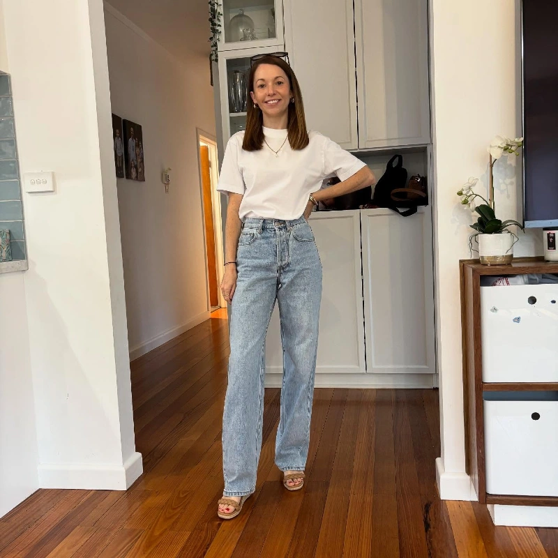 Classic White Crewneck Tee with High-Rise Light Wash Straight Jeans and Woven Sandals
