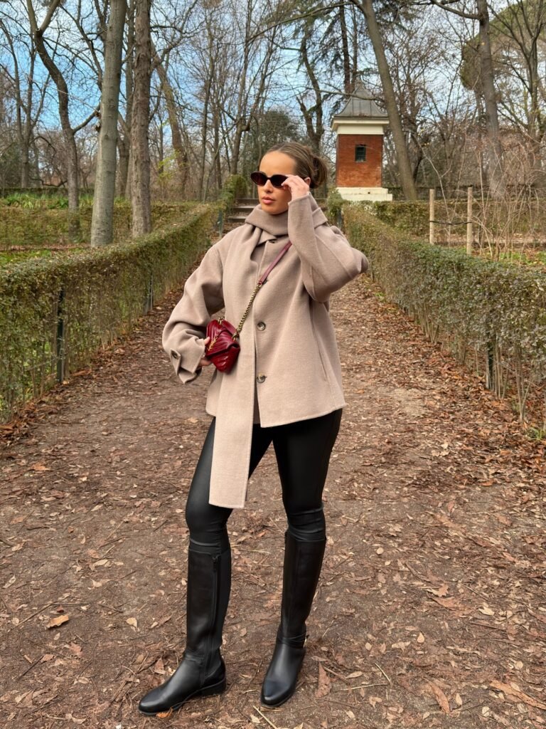 Coated Black Denim with Draped Taupe Coat and Tall Leather Boots