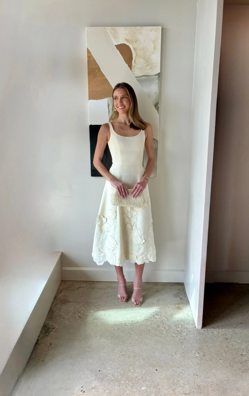 Cream Midi Dress with Floral Appliqué and Pearl Clutch