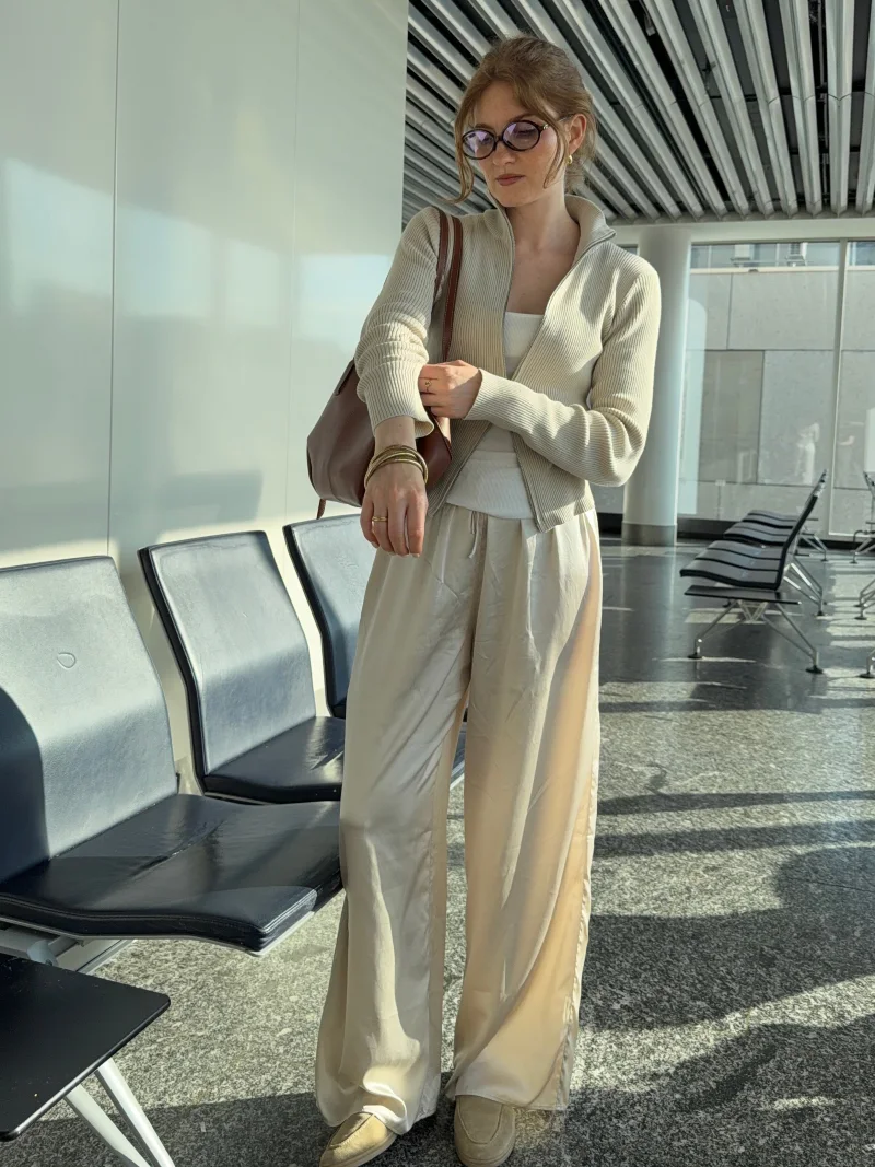 Cream Ribbed Zip-Up Cardigan with Fluid Satin Trousers and Cognac Leather Tote