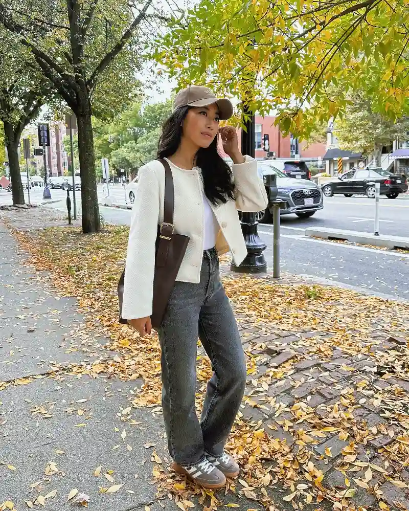Cream Textured Cropped Jacket with Charcoal Straight Jeans and Suede Sneakers