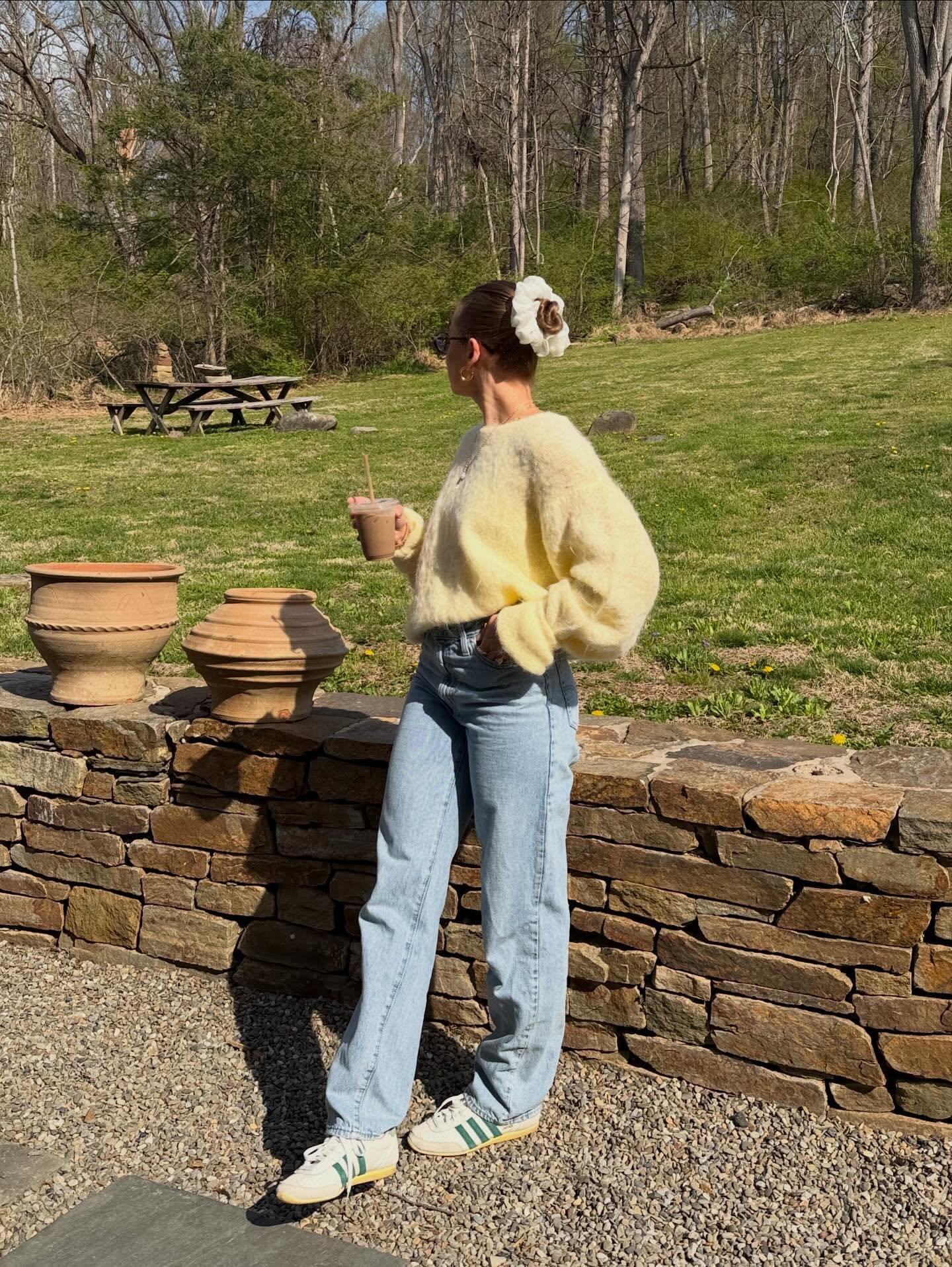 Fuzzy Pastel Sweater with Light-Wash Denim and Retro Sneakers