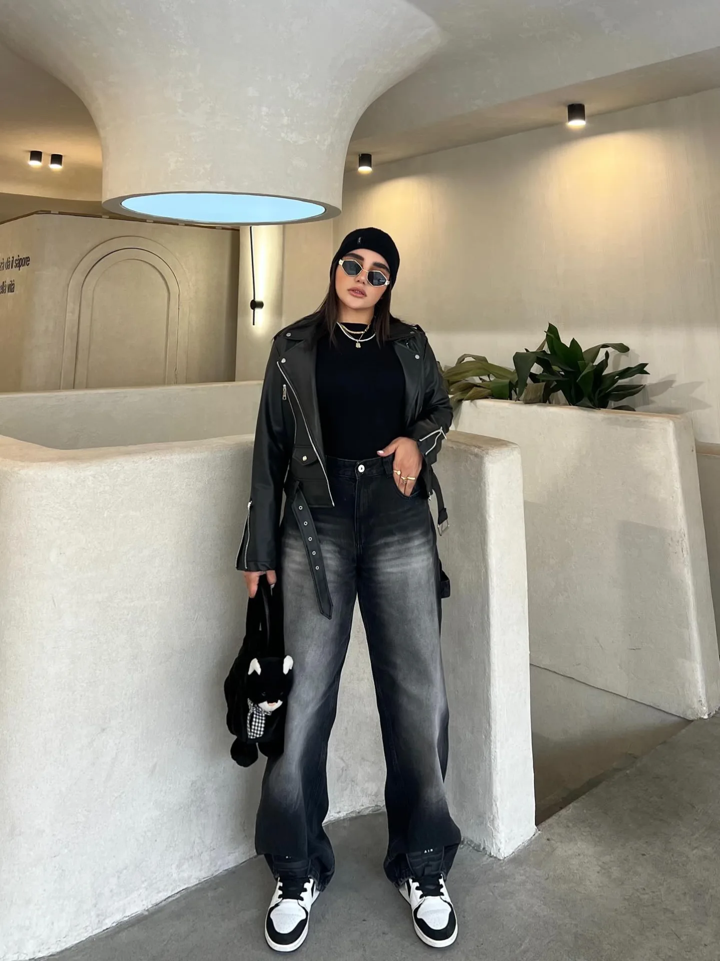Gradient Wide-Leg Jeans with Leather Moto Jacket and Chunky Sneakers