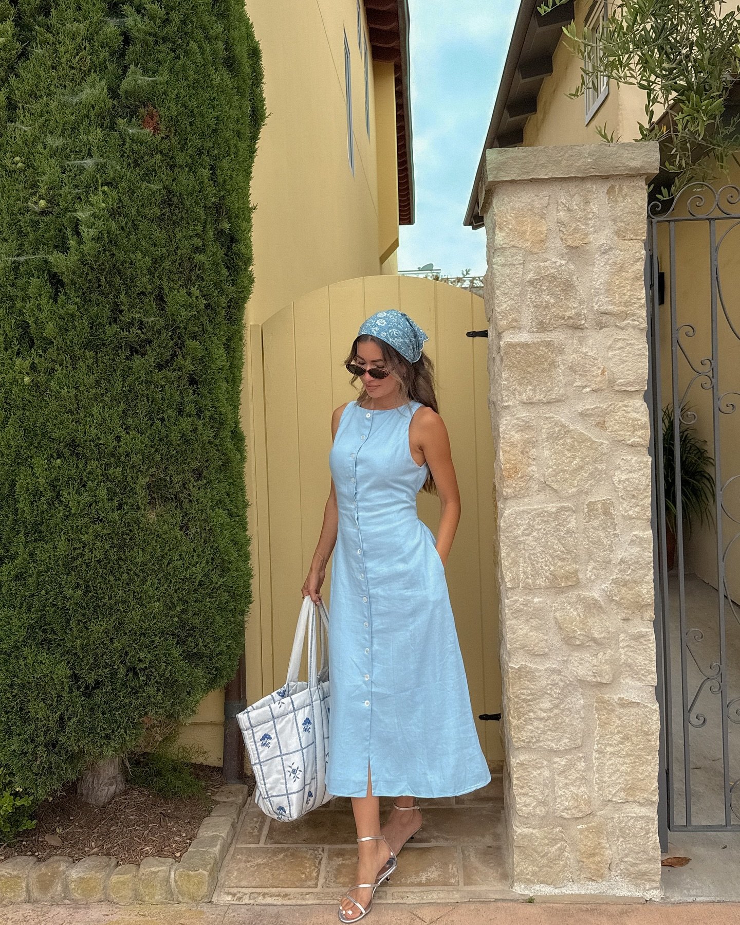 Light Blue Sleeveless Button-Down Dress with Floral Headscarf and Quilted Tote Bag