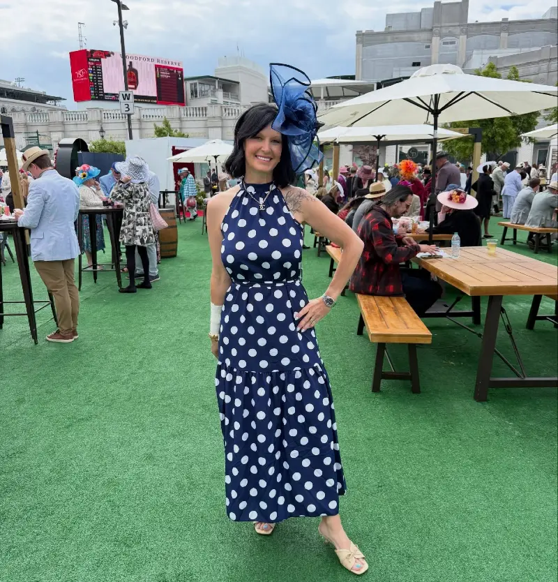 Navy Polka Dot Halter Dress with Sculptural Blue Fascinator