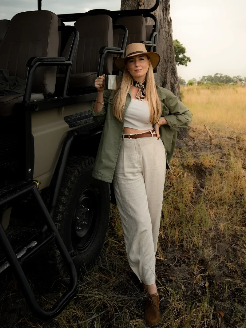 Olive Utility Jacket with White Tank Top and Cream Linen Trousers