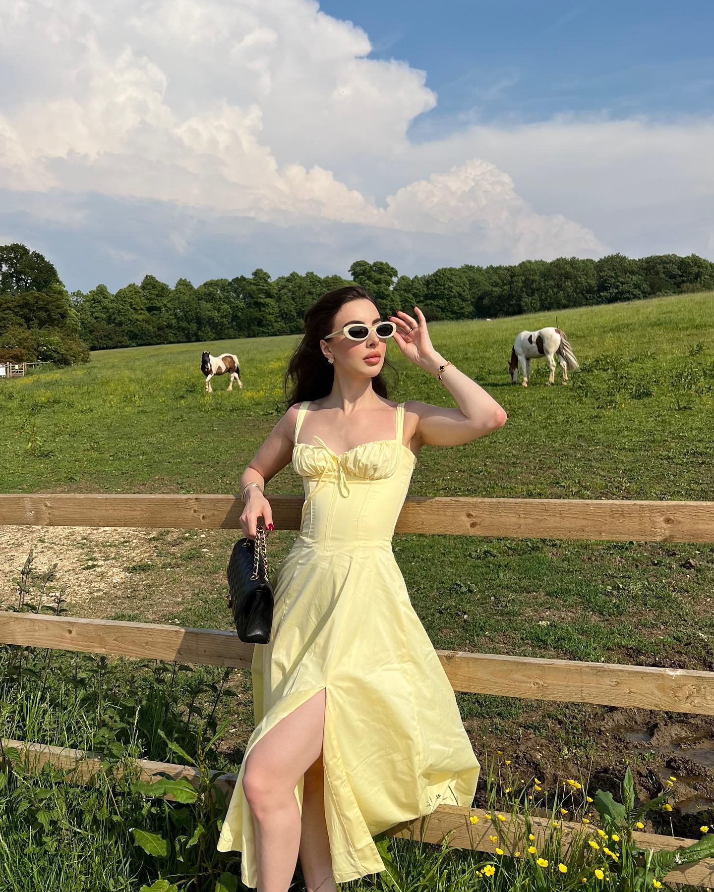 Pale Yellow Corset Midi Dress with Black Chain-Strap Bag