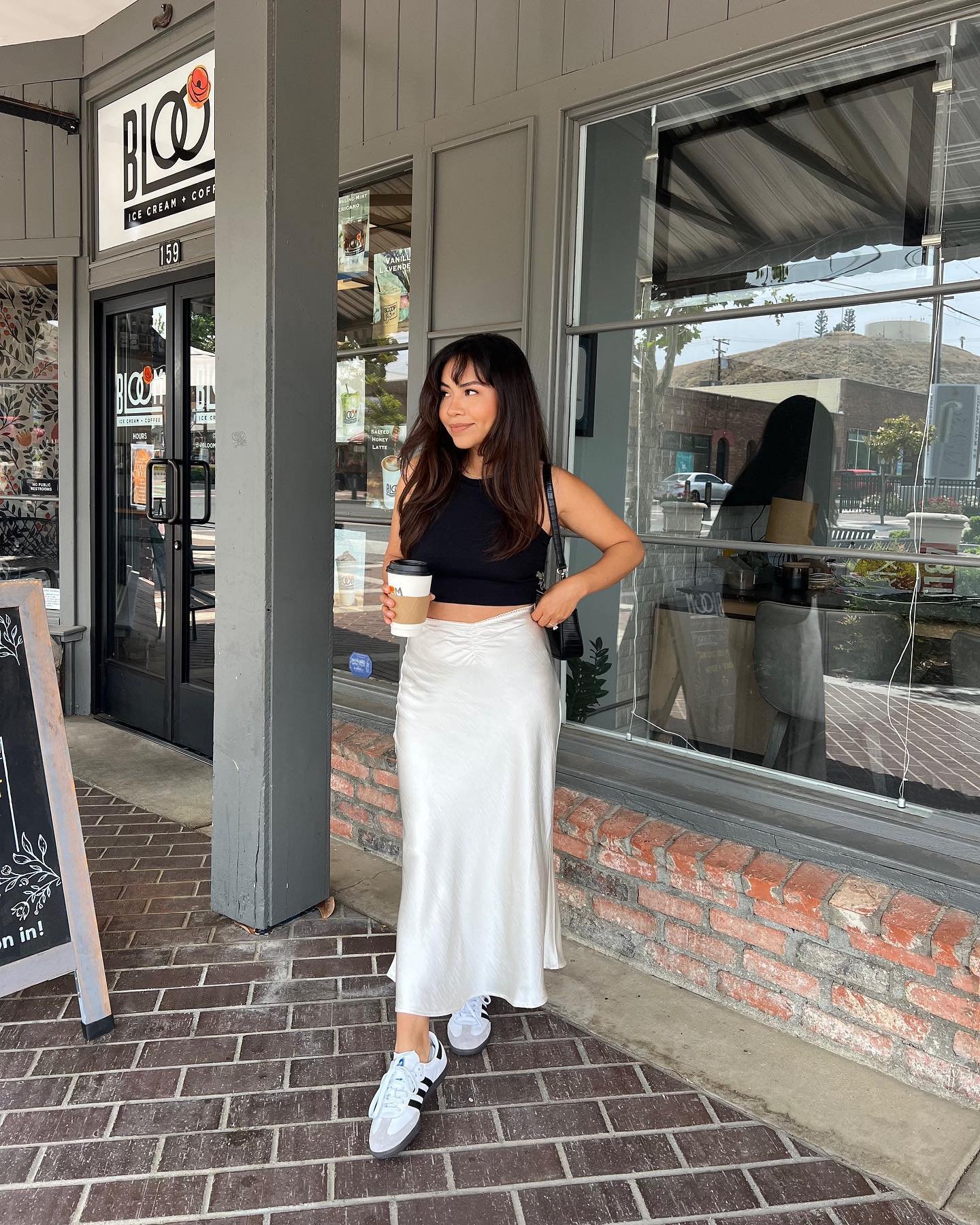 Pearl Satin Slip Skirt with Fitted Black Tank Top and Retro Sneakers
