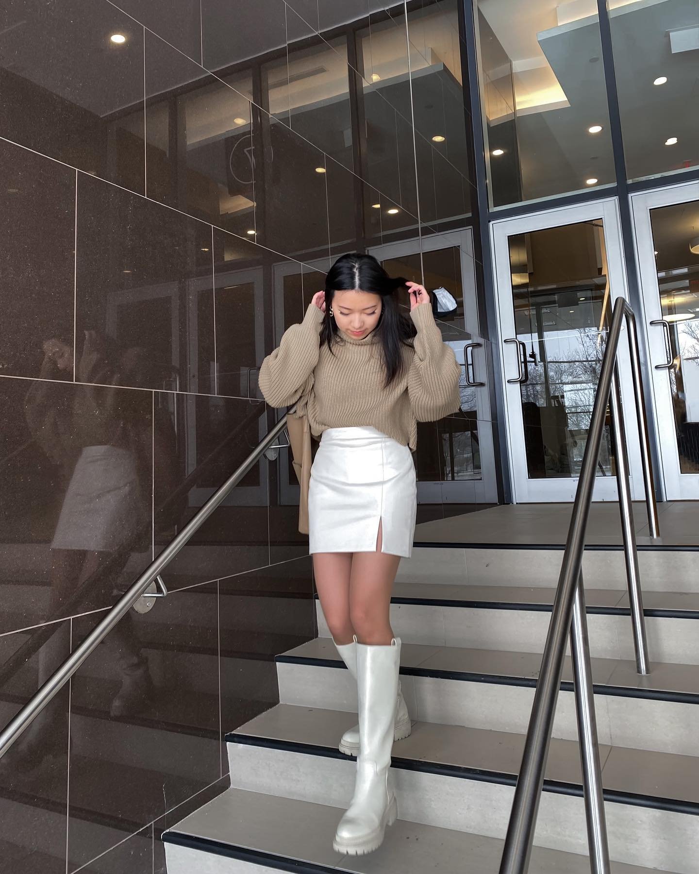 Ribbed Taupe Turtleneck Sweater with Cream Faux-Leather Mini Skirt and White Rubber Boots Display