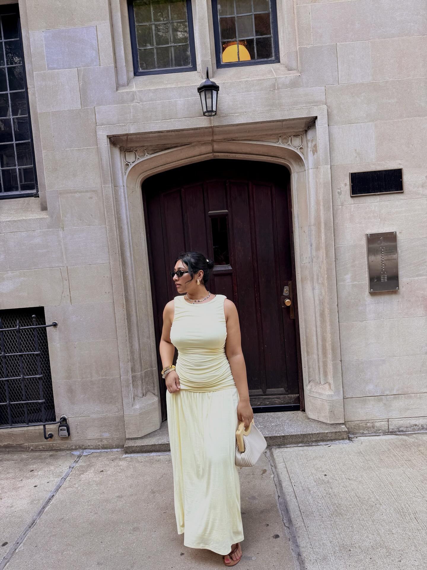 Ruched Pale Yellow Maxi Dress with a Sleeveless Bodice and Wooden Handle Clutch