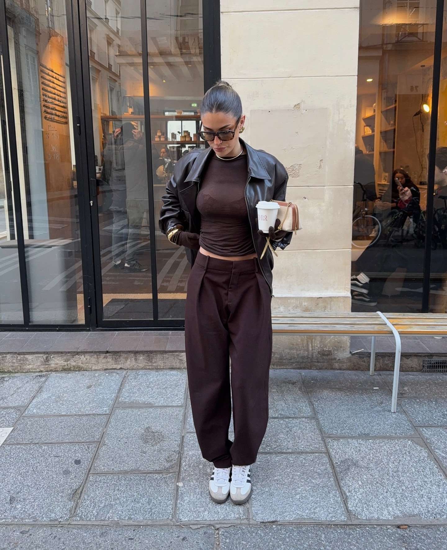Sheer Chocolate Top with Pleated Trousers and Black Leather Jacket