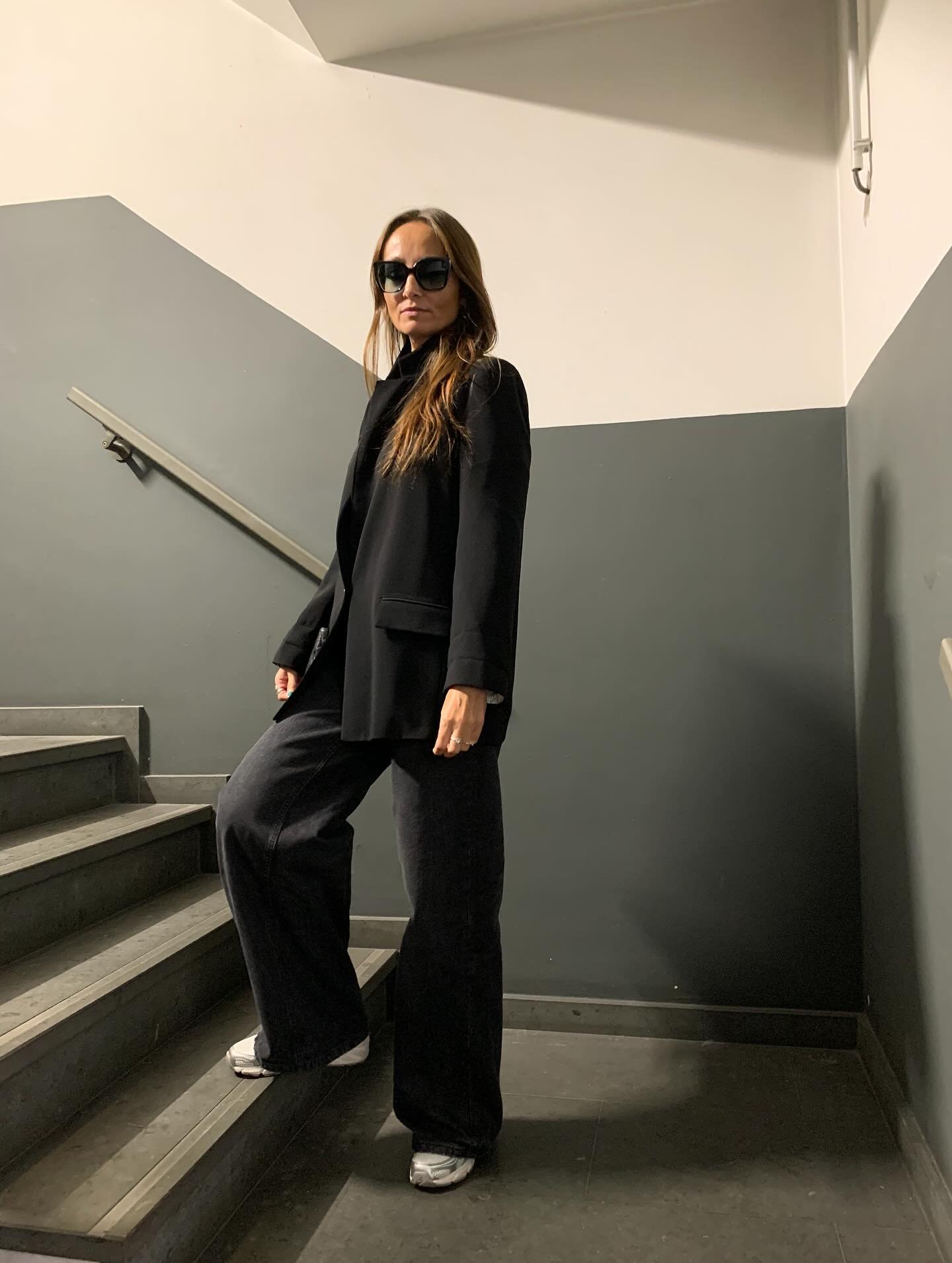 Slouchy Black Denim with Oversized Blazer and Silver Athletic Shoes
