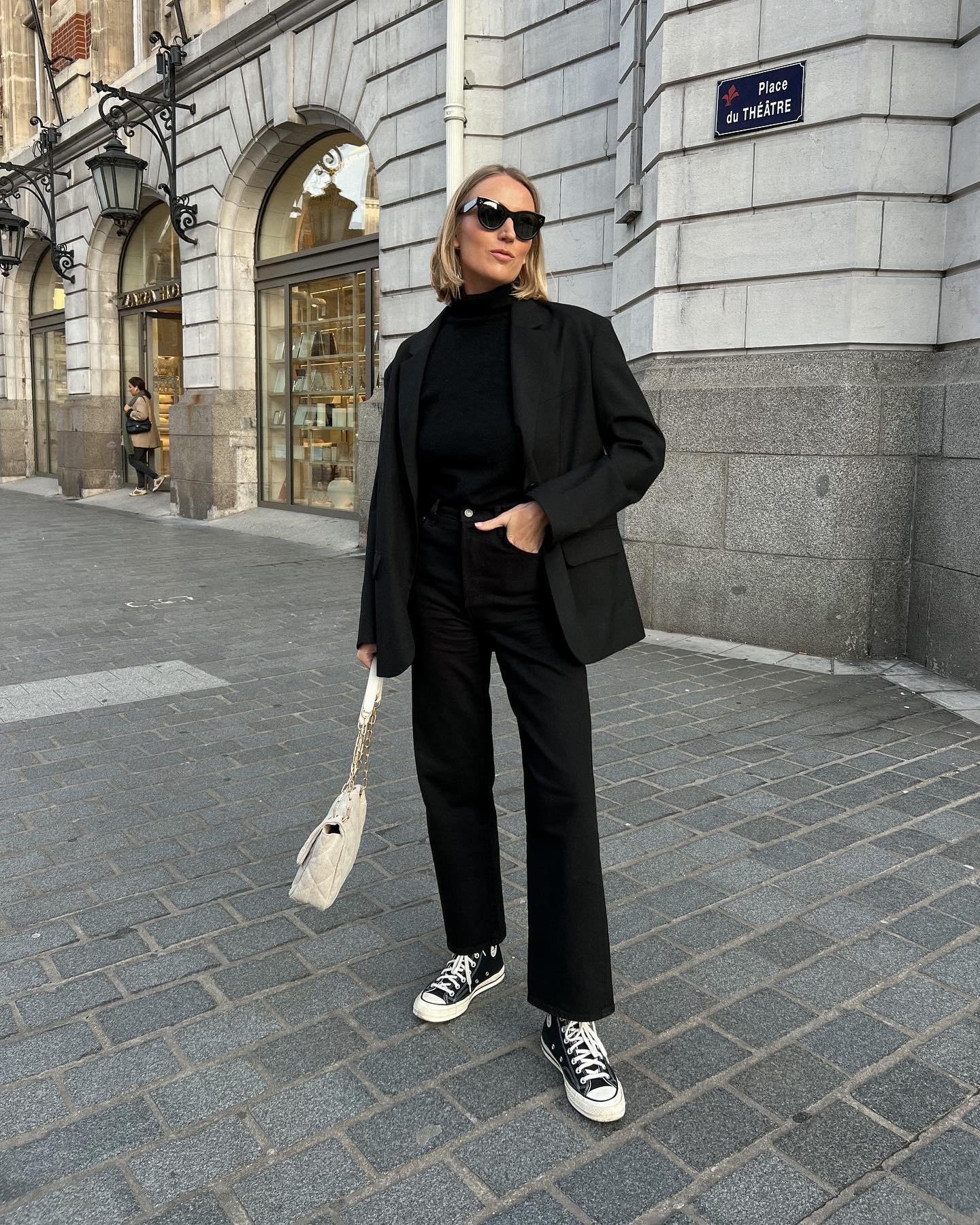 Straight-Leg Black Jeans with Classic Blazer and High-Top Canvas Shoes