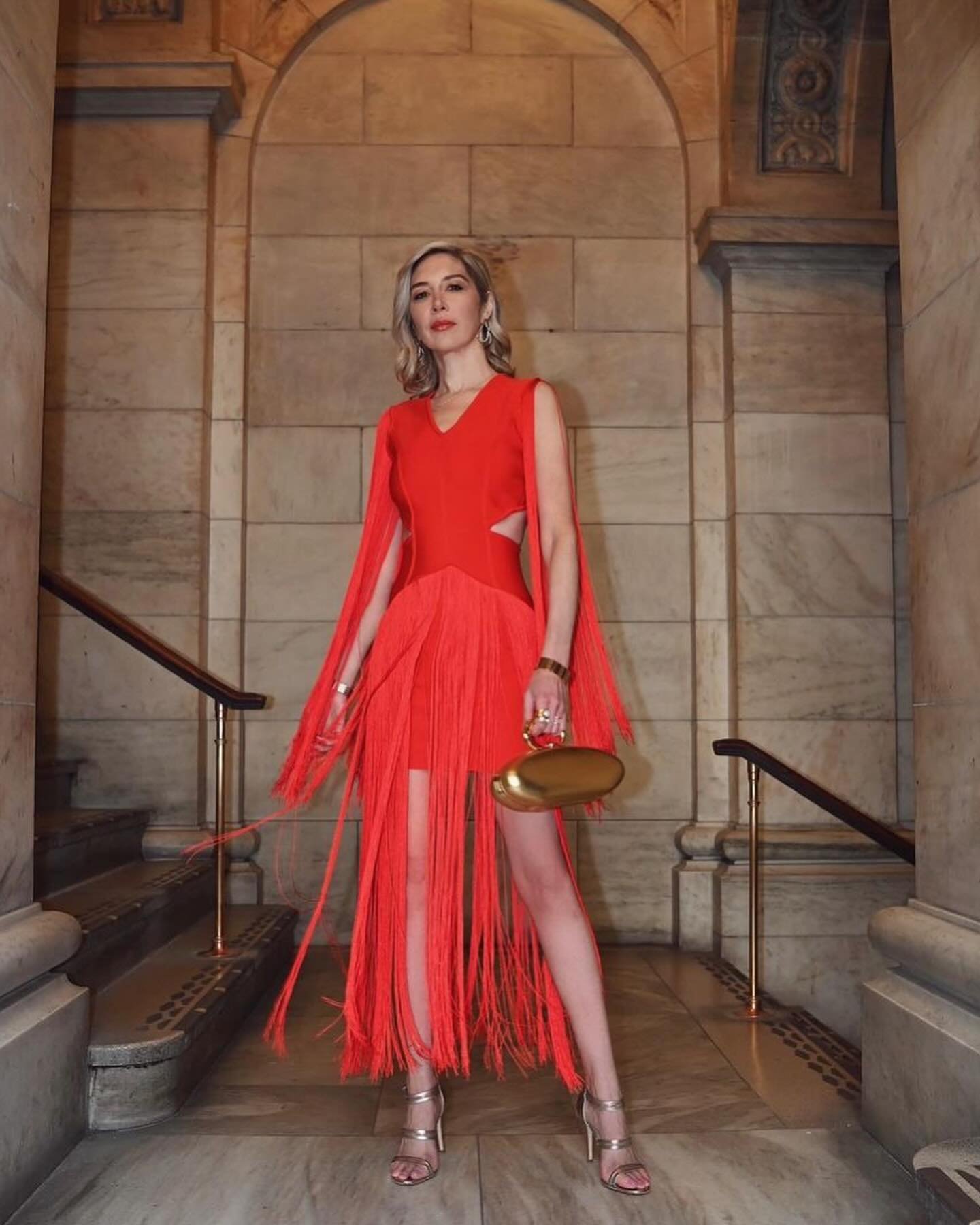 Vibrant Fringe Dress with Gold Clutch