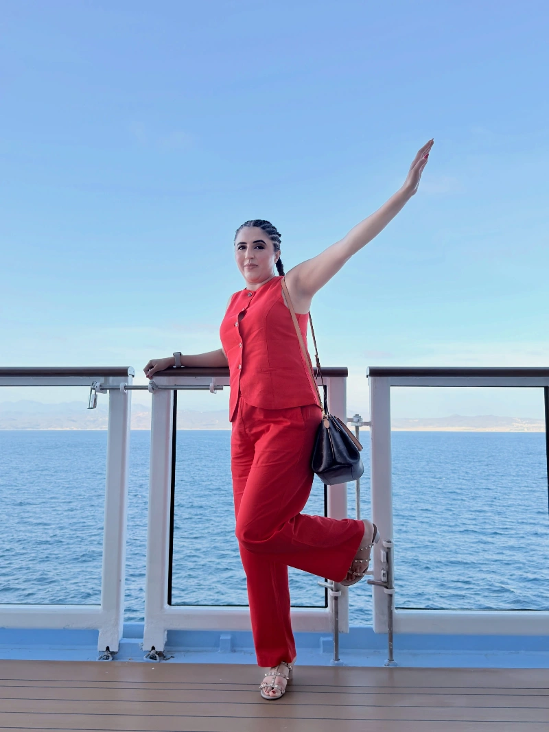 Vibrant Red Button-Down Vest and Matching Trousers with Studded Sandals