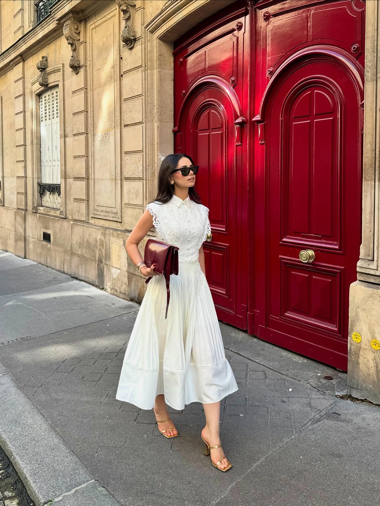 White Pleated Midi Dress with Lace Bodice and Burgundy Leather Bag