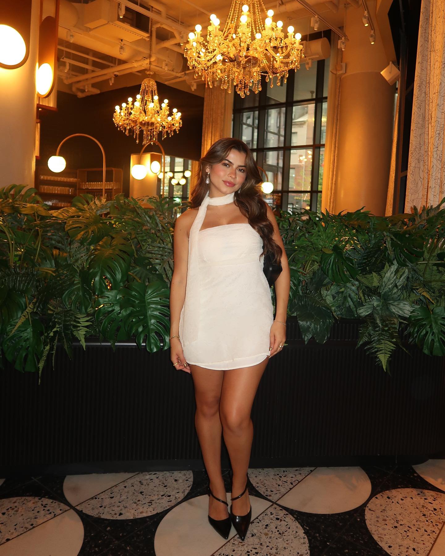 White Strapless Mini Dress with Matching Neck Scarf and Black Pumps