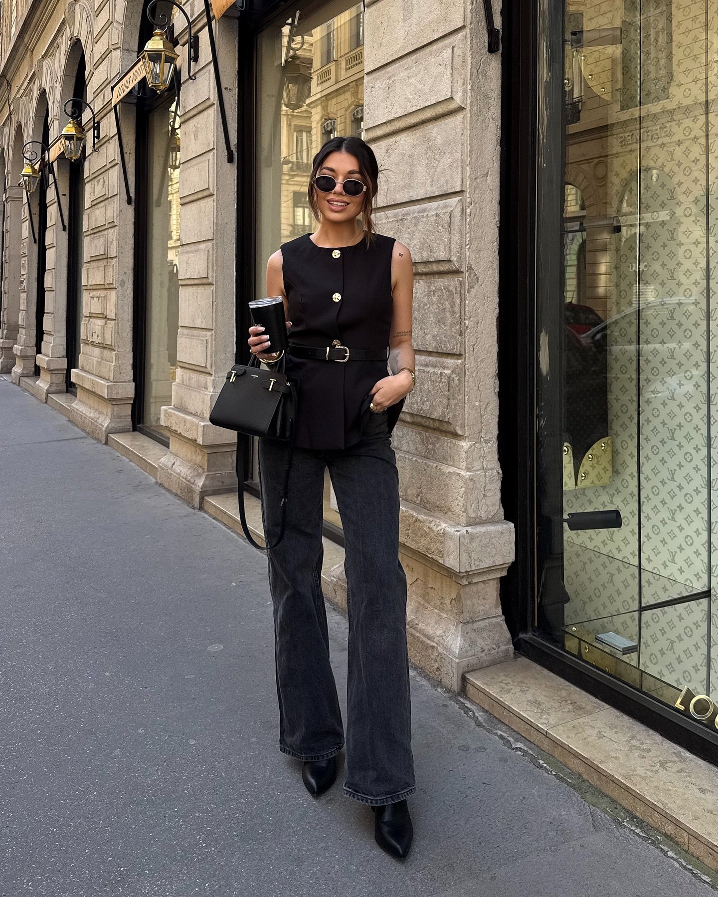 Wide-Leg Black Jeans with Sleeveless Button-Down Vest and Gold Hardware