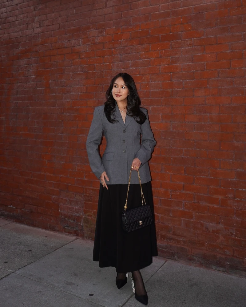 Fitted Gray Blazer with Black Midi Skirt and Quilted Shoulder Bag