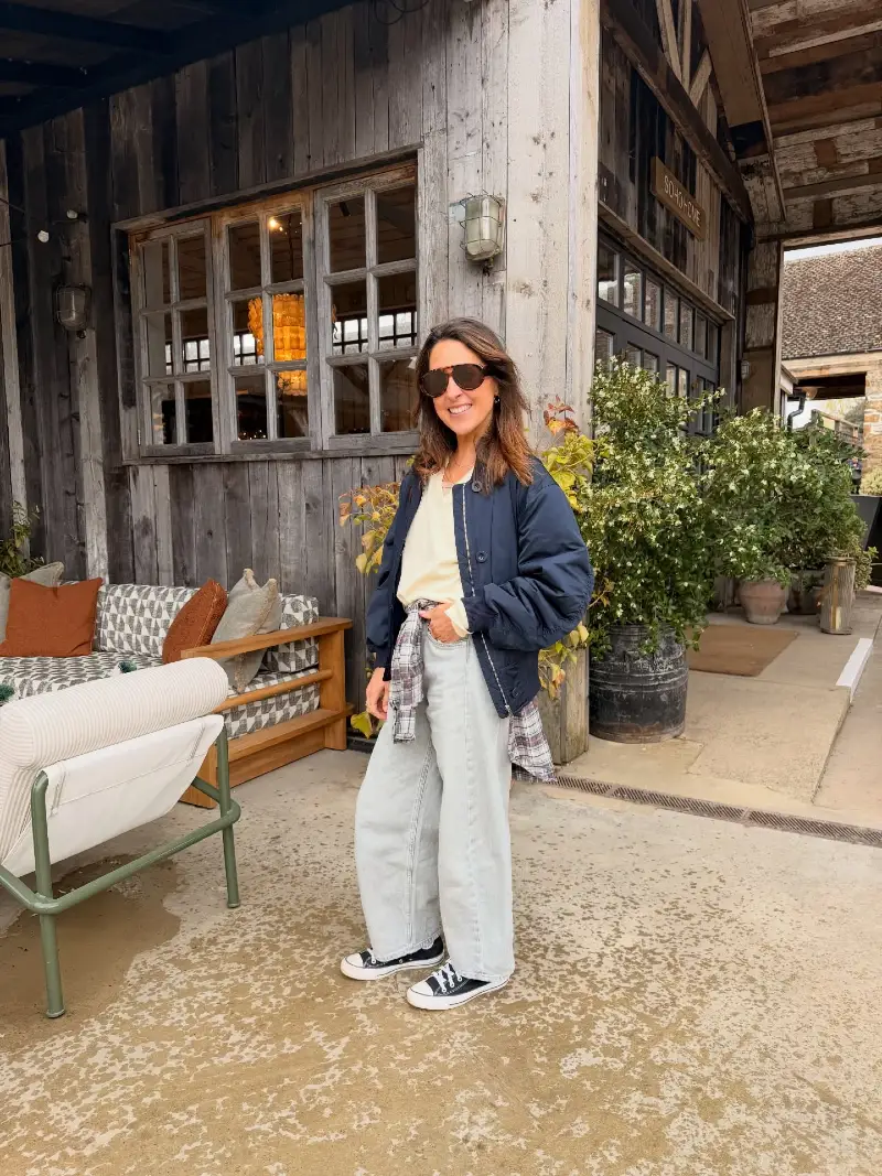 Navy Bomber Jacket with Cream Knit and Wide Leg Jeans