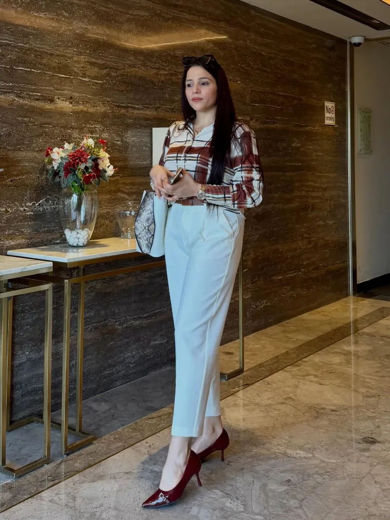 Plaid Blouse with Ivory Tailored Trousers and Burgundy Pumps