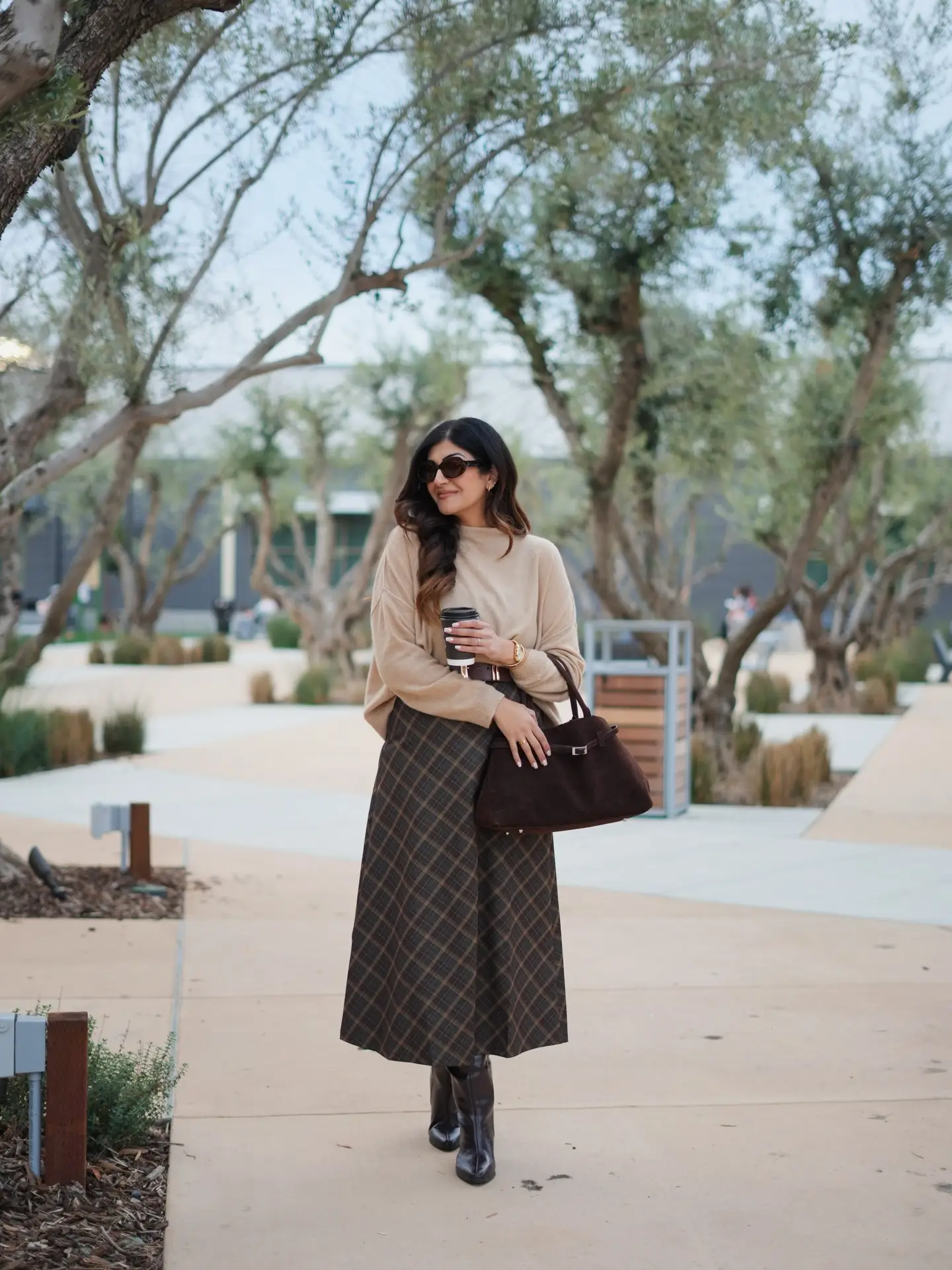 Beige Sweater With Plaid Midi Skirt and Tall Boots