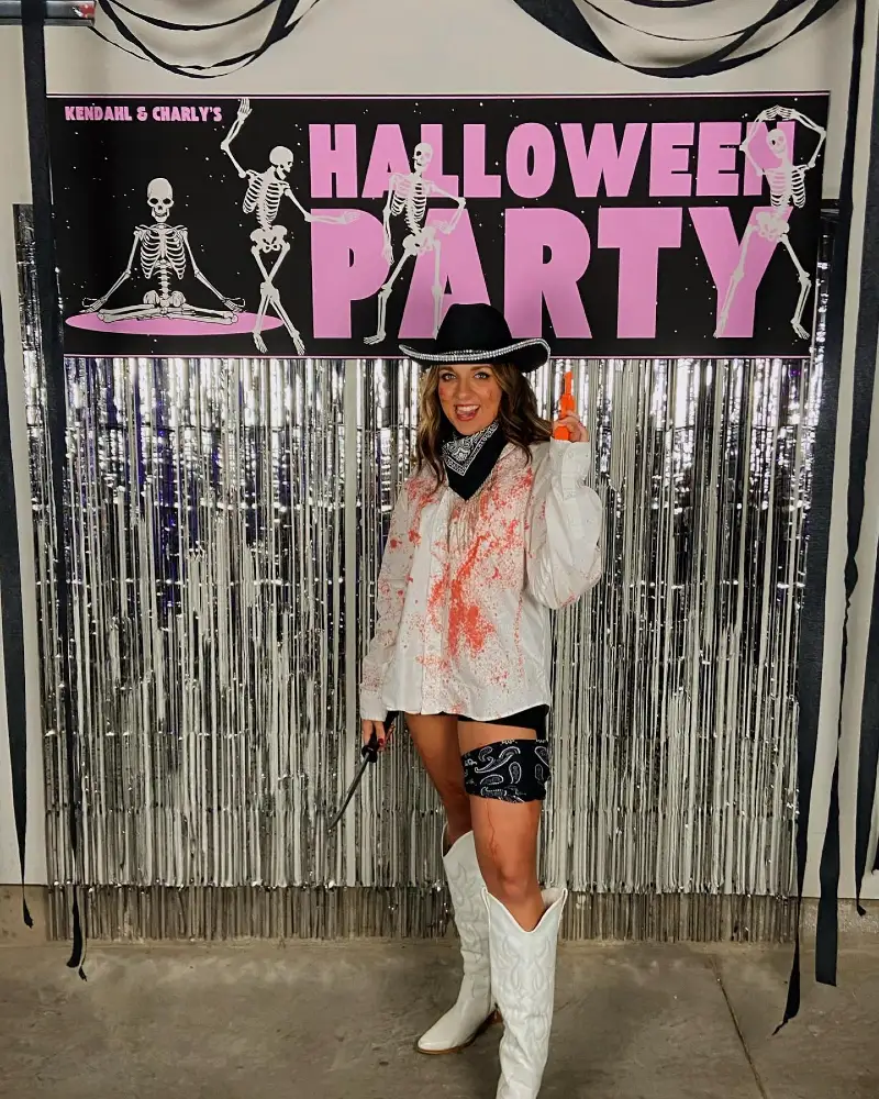Blood-Splat Bootleg Cowgirl Outfit with White Boots and Bandana Holster